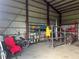 Spacious workshop with shelving, tools, and various equipment at 31730 Clay Gully Rd, Myakka City, FL 34251