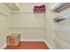 Large walk-in closet with wire shelving for ample storage at 3970 Serenity Cir, Sarasota, FL 34235