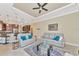 Open living room with kitchen view and comfortable seating at 3970 Serenity Cir, Sarasota, FL 34235