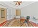 Spacious home office with a desk and comfortable seating at 3970 Serenity Cir, Sarasota, FL 34235