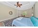 Spacious Primary bedroom with large windows and ceiling fan at 3970 Serenity Cir, Sarasota, FL 34235