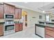 Kitchen with stainless steel appliances and ample cabinet space at 3970 Serenity Cir, Sarasota, FL 34235