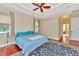 Primary bedroom with ensuite bathroom access and hardwood floors at 3970 Serenity Cir, Sarasota, FL 34235