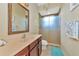 Updated bathroom with a walk-in shower, toilet, and vanity at 3970 Serenity Cir, Sarasota, FL 34235