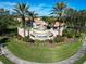 Cascades community entrance with fountain and landscaping at 4418 65Th E Ter, Sarasota, FL 34243