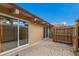 Private backyard patio with wood fence and sliding glass doors at 500 N Jefferson Ave # G5, Sarasota, FL 34237