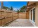 Private patio with brick pavers and wood fence for added privacy at 500 N Jefferson Ave # G5, Sarasota, FL 34237