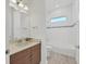 Bathroom with tub, toilet and modern vanity at 5058 Surfside Cir, Lakewood Ranch, FL 34211