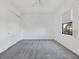 Spacious bedroom with grey carpet and double door closet at 5058 Surfside Cir, Lakewood Ranch, FL 34211