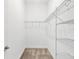 Spacious closet with wire shelving and hanging rods at 5058 Surfside Cir, Lakewood Ranch, FL 34211