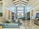 Bright and spacious community clubhouse lobby with comfortable seating at 5058 Surfside Cir, Lakewood Ranch, FL 34211
