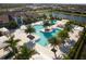Large community pool with plenty of lounge chairs and shade structures at 5058 Surfside Cir, Lakewood Ranch, FL 34211