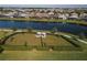 Community dog park with fenced area and seating at 5058 Surfside Cir, Lakewood Ranch, FL 34211