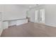 Home office with built-in desk and hardwood floors at 5058 Surfside Cir, Lakewood Ranch, FL 34211