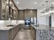 Modern kitchen with stainless steel appliances, granite countertops, and ample cabinet space at 5058 Surfside Cir, Lakewood Ranch, FL 34211