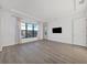 Spacious main bedroom with large windows and hardwood flooring at 5058 Surfside Cir, Lakewood Ranch, FL 34211