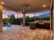 Spacious outdoor kitchen and patio area perfect for entertaining guests poolside at 5058 Surfside Cir, Lakewood Ranch, FL 34211
