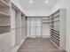 Large walk-in closet with ample shelving and hanging space at 5058 Surfside Cir, Lakewood Ranch, FL 34211