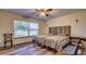 Bedroom with two twin beds and a rustic design at 560 Oakford Rd, Sarasota, FL 34240