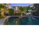 Inviting pool area with surrounding patio furniture at 5610 Avenida Del Mare, Sarasota, FL 34242