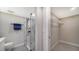 Updated bathroom featuring a walk-in shower and ample closet space at 5760 Midnight Pass Rd # 307D, Sarasota, FL 34242