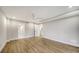 Spacious bedroom with tile floors and access to bathroom at 5760 Midnight Pass Rd # 307D, Sarasota, FL 34242