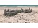 Elaborate sandcastle on a pristine beach at 5760 Midnight Pass Rd # 307D, Sarasota, FL 34242