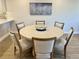 Dining table with seating for six at 5760 Midnight Pass Rd # 307D, Sarasota, FL 34242