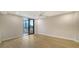 Bedroom with tile floors and access to balcony and bathroom at 5760 Midnight Pass Rd # 307D, Sarasota, FL 34242