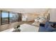Open living space with access to balcony and ocean view at 5760 Midnight Pass Rd # 307D, Sarasota, FL 34242