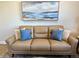 Living room with sofa and pillows at 5760 Midnight Pass Rd # 307D, Sarasota, FL 34242