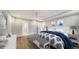 Main bedroom with plush bedding and built-in bench at 5760 Midnight Pass Rd # 307D, Sarasota, FL 34242