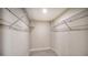 Large closet with wire shelving, providing efficient storage solutions at 5760 Midnight Pass Rd # 307D, Sarasota, FL 34242