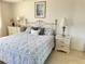 Light-filled main bedroom with soft decor, furnishings, and a neutral color scheme at 5770 Midnight Pass Rd # 705C, Sarasota, FL 34242