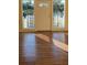 Bright entryway with wood-look floors and exterior door access at 601 27Th W St, Bradenton, FL 34205