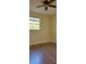 Bedroom featuring wood floors and a window at 601 27Th W St, Bradenton, FL 34205