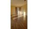 Spacious living room featuring wood-look floors and large windows at 601 27Th W St, Bradenton, FL 34205