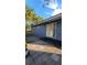 Small patio with flagstone and sliding glass door at 601 27Th W St, Bradenton, FL 34205