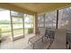 Relaxing screened porch overlooking a pond at 6310 Grand Oak Cir # 106, Bradenton, FL 34203