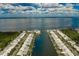 Aerial view of waterfront homes and canals at 957 Spanish N Dr, Longboat Key, FL 34228