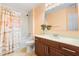 Clean bathroom with shower/tub combo, vanity, and updated fixtures at 1064 N Tamiami Trl # 1311, Sarasota, FL 34236