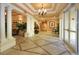 Elegant building lobby with high ceilings and columns at 1064 N Tamiami Trl # 1311, Sarasota, FL 34236
