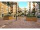 Well-maintained courtyard featuring a fountain and potted plants at 1064 N Tamiami Trl # 1311, Sarasota, FL 34236