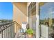Balcony with chair, plant, and water view at 1064 N Tamiami Trl # 1311, Sarasota, FL 34236