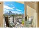 Balcony with chairs and views of the city and water at 1064 N Tamiami Trl # 1311, Sarasota, FL 34236
