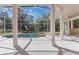 Relaxing screened pool and spa area at 1076 Mallard Marsh Dr, Osprey, FL 34229