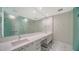 Bathroom with double vanity, marble floors, and large shower at 1155 N Gulfstream Ave # 603, Sarasota, FL 34236