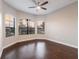 Bright bedroom with hardwood floors and bay windows at 13415 Swiftwater Way, Bradenton, FL 34211