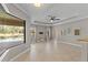 Living room with pool view and sliding glass doors at 13415 Swiftwater Way, Bradenton, FL 34211