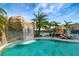 Refreshing resort-style pool with a waterfall feature at 17520 Gawthrop Dr # 103, Bradenton, FL 34211